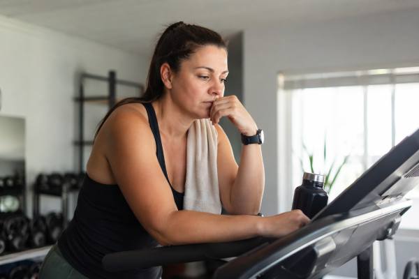 Too much cardio can stall weight loss by increasing hunger, reducing recovery, and lowering daily movement. Learn when more helps, when it backfires, and how to fix a cardio-driven plateau.