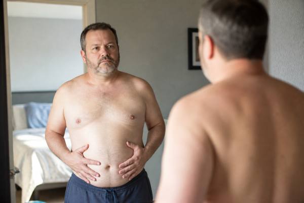 Learn how low testosterone and weight gain in men are connected, which symptoms matter, how diagnosis works, and what actually helps with fat loss, muscle retention, and long-term health.