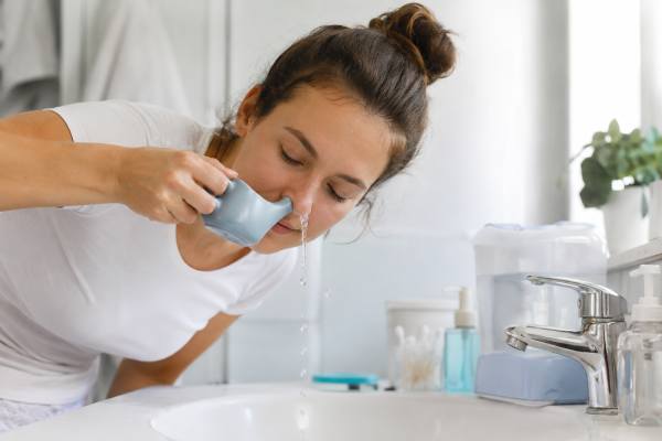 Learn how to use a neti pot safely with distilled or boiled water, proper cleaning, correct saline technique, and the common mistakes that can turn a helpful sinus rinse into a problem.