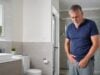 Blood in urine in men can come from infection, stones, prostate problems, kidney disease, or cancer. Learn urgent warning signs, common causes, tests, and next steps.