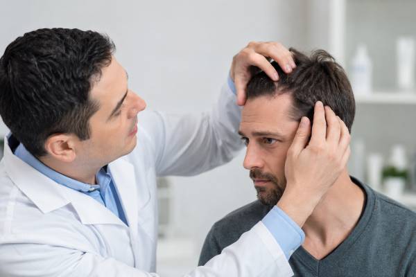 Compare dandruff vs seborrheic dermatitis in men, including scalp, beard, face, and chest symptoms, common causes, treatment options, shampoo tips, and when to see a dermatologist.