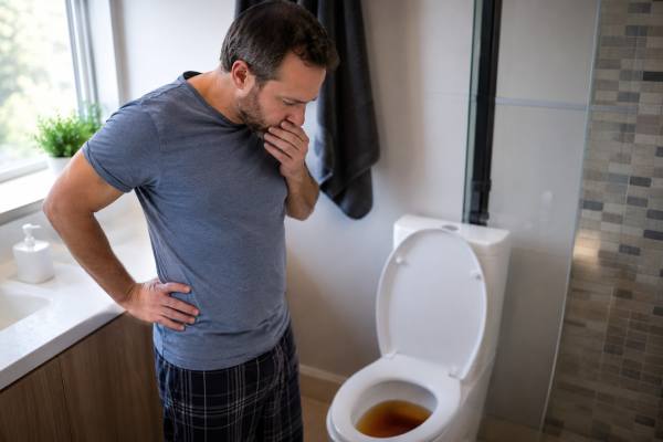 Learn what dark urine can mean, how to tell dehydration from liver, kidney, blood, infection, and muscle causes, and which red flags need urgent medical care.