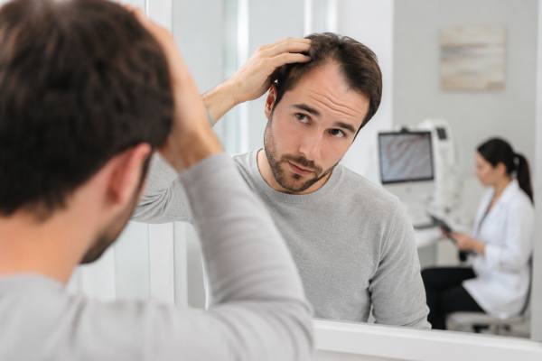 Learn the early signs of a receding hairline in men, why it happens, when to get checked, and which treatments may slow hair loss or improve thickness.