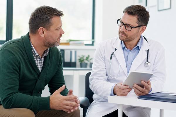 Learn when men should see a doctor for chest pain, urinary changes, ED, testicular symptoms, bleeding, fatigue, mood changes, weight loss, and routine screenings.