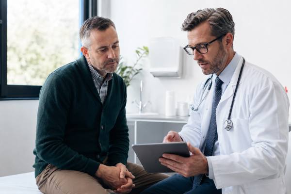 Learn when men should see a urologist for urinary symptoms, blood in urine, testicular pain, ED, prostate concerns, fertility problems, and urgent warning signs.