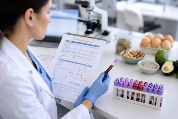 Learn what a vitamin B7 biotin test measures, normal range examples, causes of low biotin, deficiency symptoms, high supplement levels, lab interference, and follow-up testing.