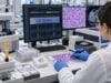 A cholangiocarcinoma biomarker panel combines CA 19-9 with FGFR2, IDH1/2, BRAF, HER2, MSI/MMR, and other molecular tests to guide monitoring and targeted treatment.